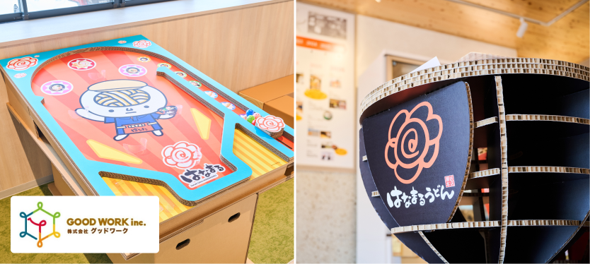 ダンボールでつくられた体験ゲーム機や電車、うどん鉢のモニュメント